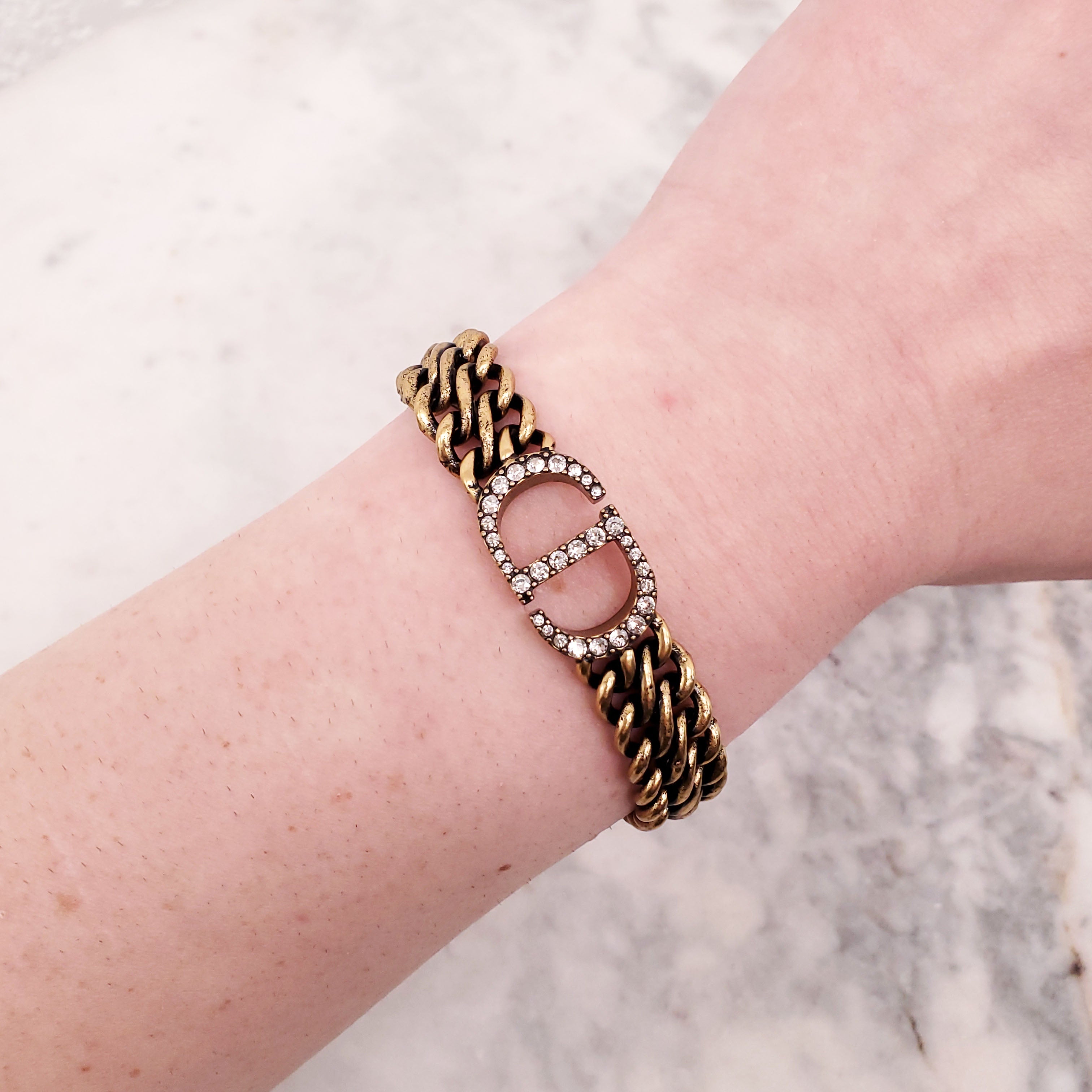 CHRISTIAN DIOR GOLD BRACELET AND EARRINGS SET WITH DIAMANTE CD DETAIL