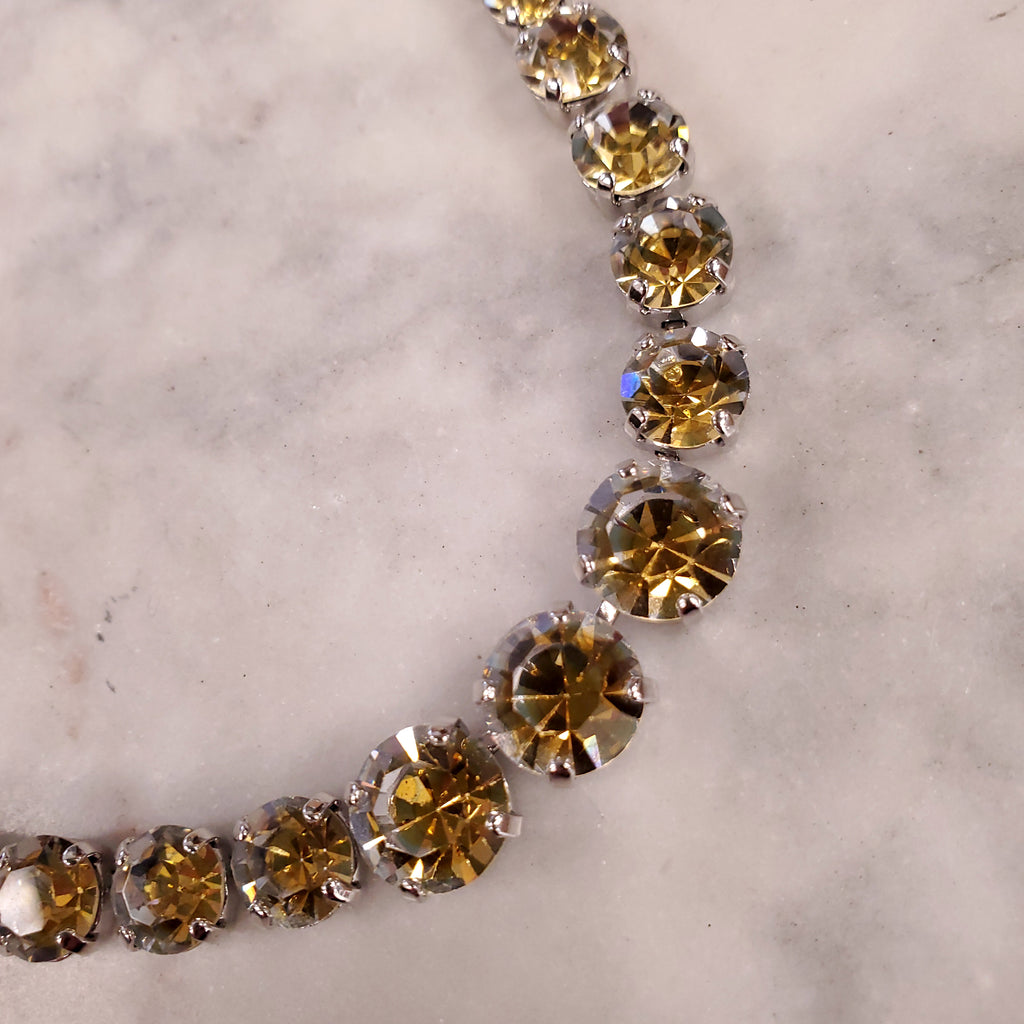 DIOR 1995 NECKLACE WITH SINGLE ROW OF GRADUATED DIORITE STONES SET IN RHODIUM WITH MATCHING EARRINGS