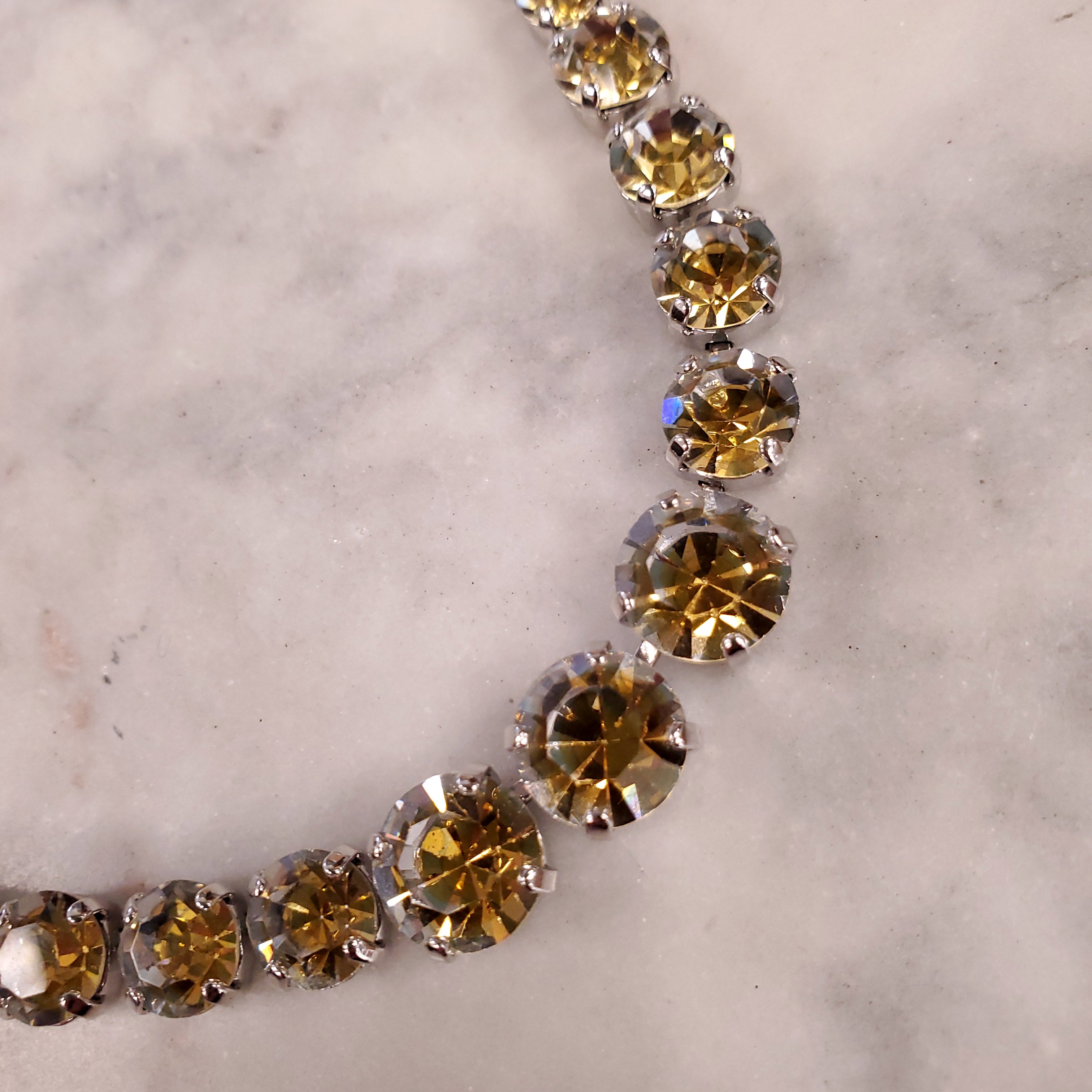 DIOR 1995 NECKLACE WITH SINGLE ROW OF GRADUATED DIORITE STONES SET IN RHODIUM WITH MATCHING EARRINGS