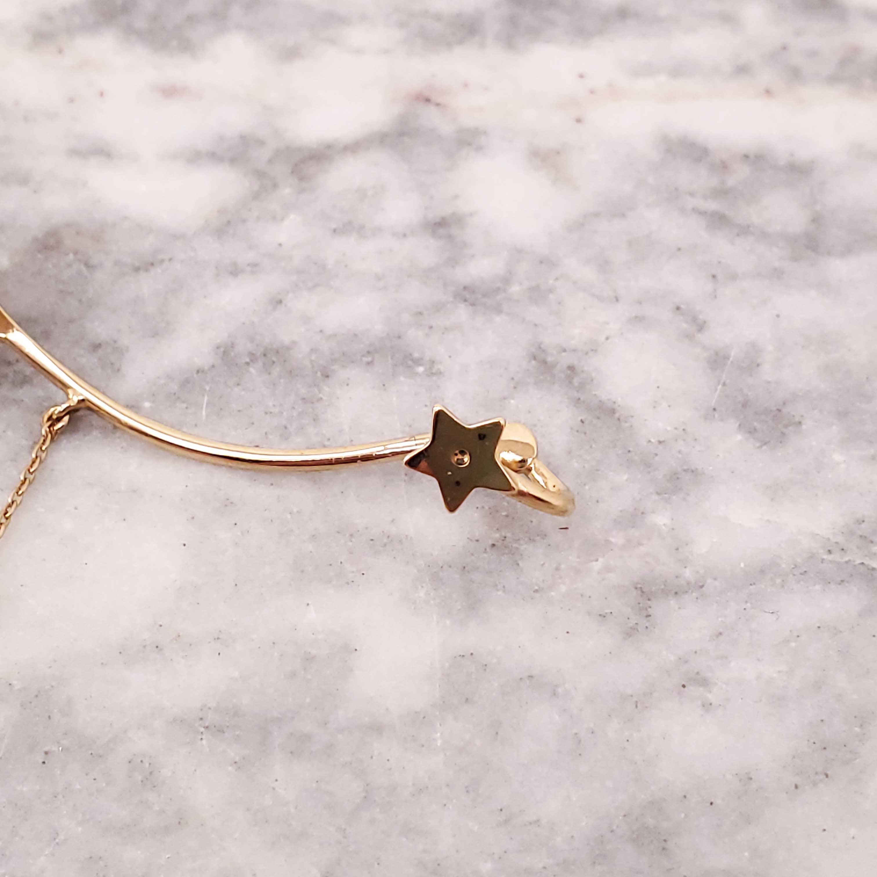 DIOR GOLD PEARL DANGLING EAR CUFF