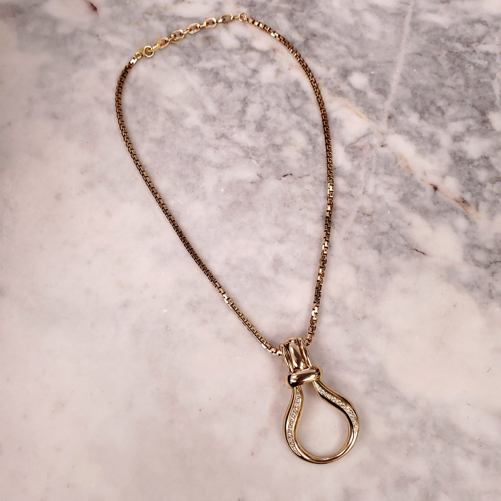 DIOR PENDANT GOLD NECKLACE WITH INTERLOCKING HOOPS ON GOLD CHAIN
