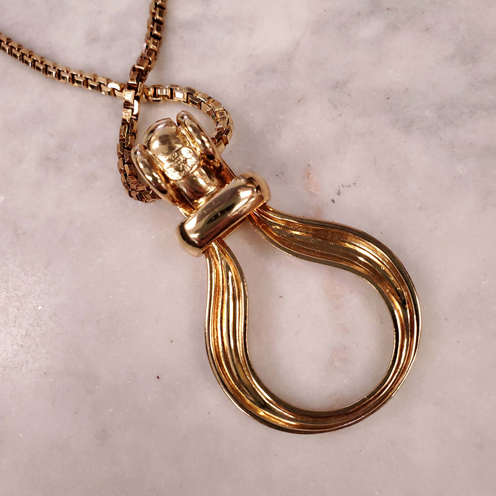 DIOR PENDANT GOLD NECKLACE WITH INTERLOCKING HOOPS ON GOLD CHAIN