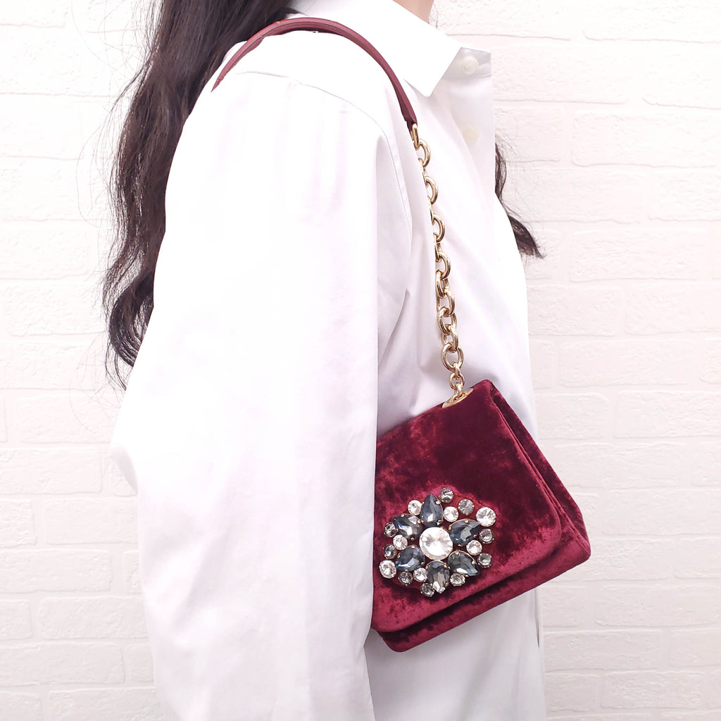 DOLCE & GABBANA BURGUNDY VELVET SHOULDER BAG WITH CRYSTAL EMBLEM