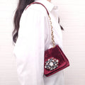 DOLCE & GABBANA BURGUNDY VELVET SHOULDER BAG WITH CRYSTAL EMBLEM