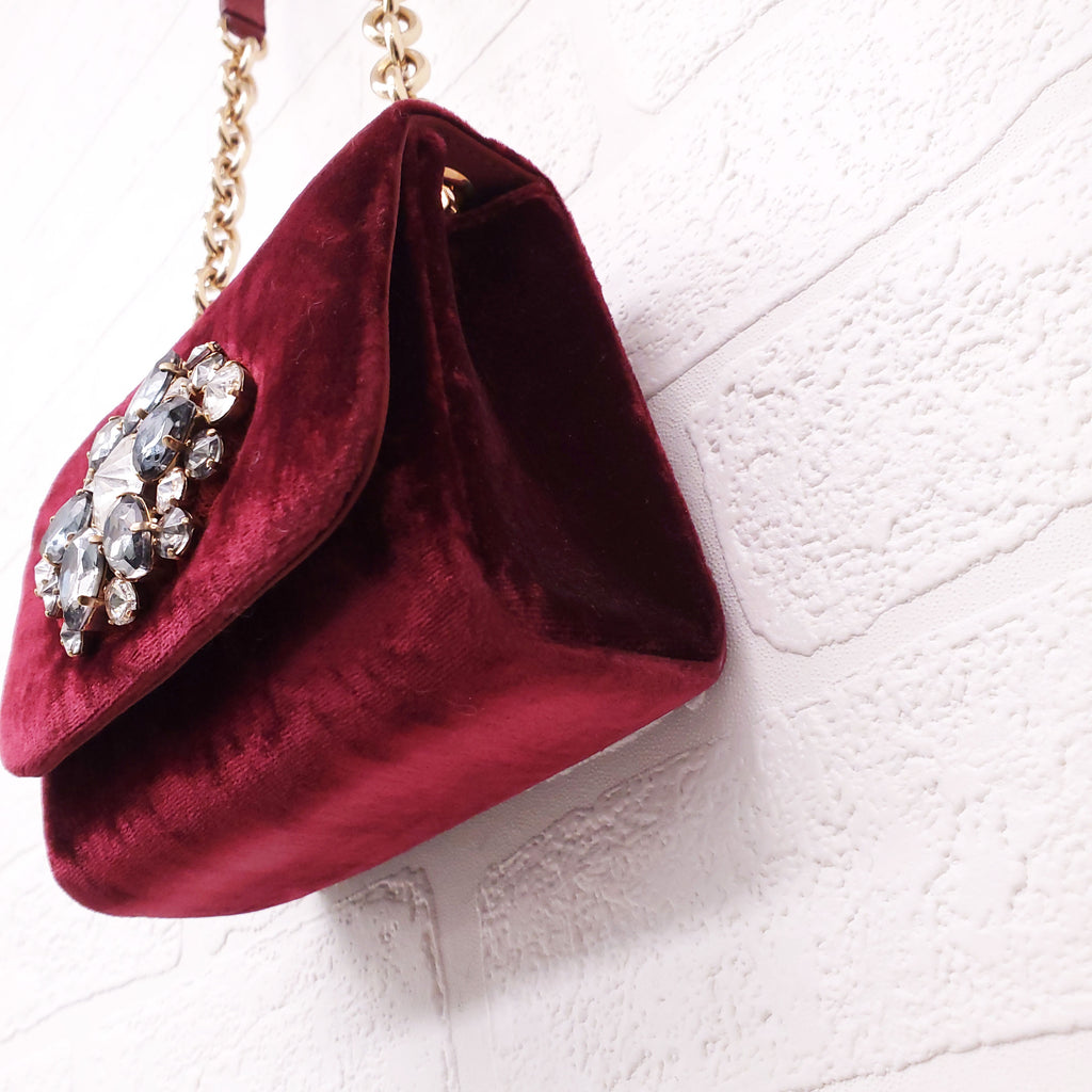 DOLCE & GABBANA BURGUNDY VELVET SHOULDER BAG WITH CRYSTAL EMBLEM