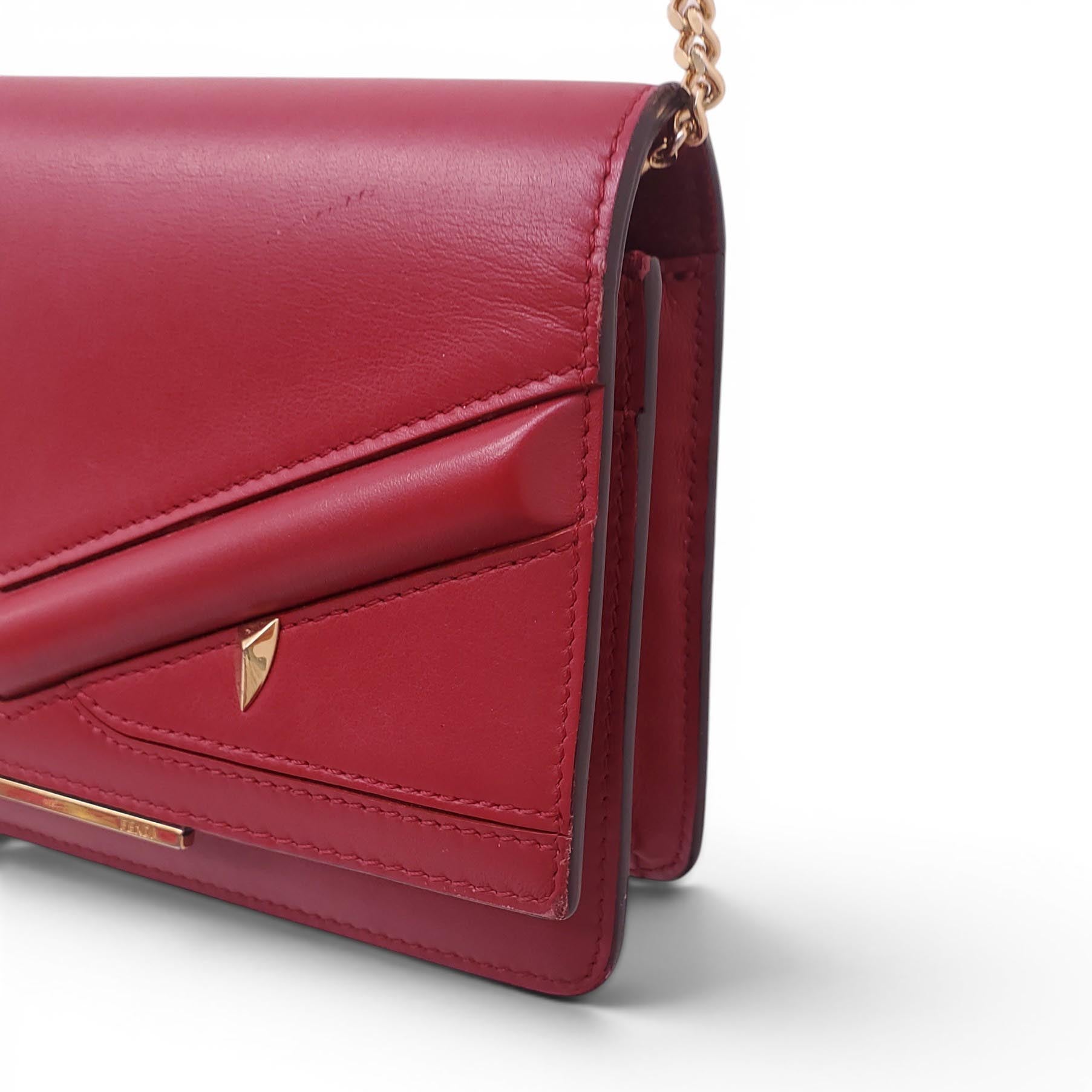 FENDI RED LEATHER MONSTER WALLET ON CHAIN