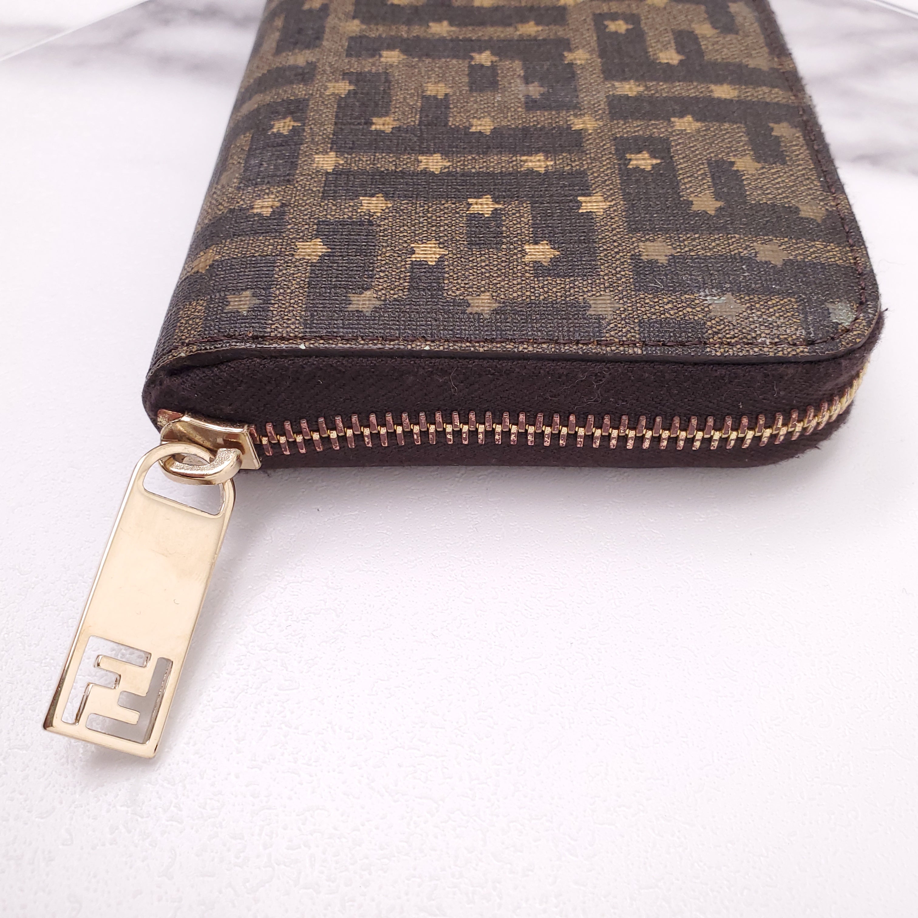 FENDI ZUCCA PRINT WALLET WITH STAR DETAILS