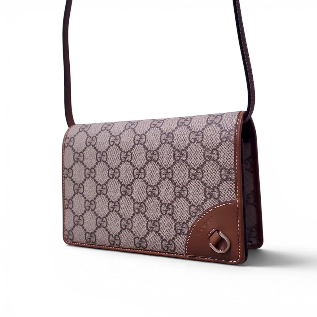 GUCCI GG EMBLEM WALLET WITH LEATHER STRAP
