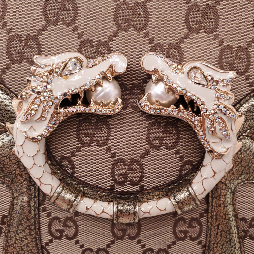 GUCCI GG MONOGRAM CANVAS AND LEATHER TRIM BAG WITH DRAGON EMBLEM