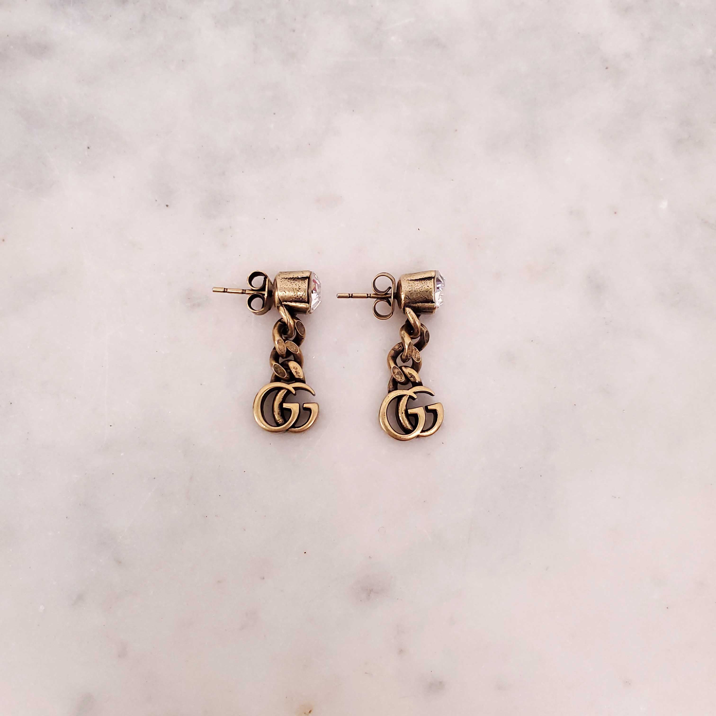 GUCCI GOLD LOGO DROP EARRINGS WITH CRYSTAL