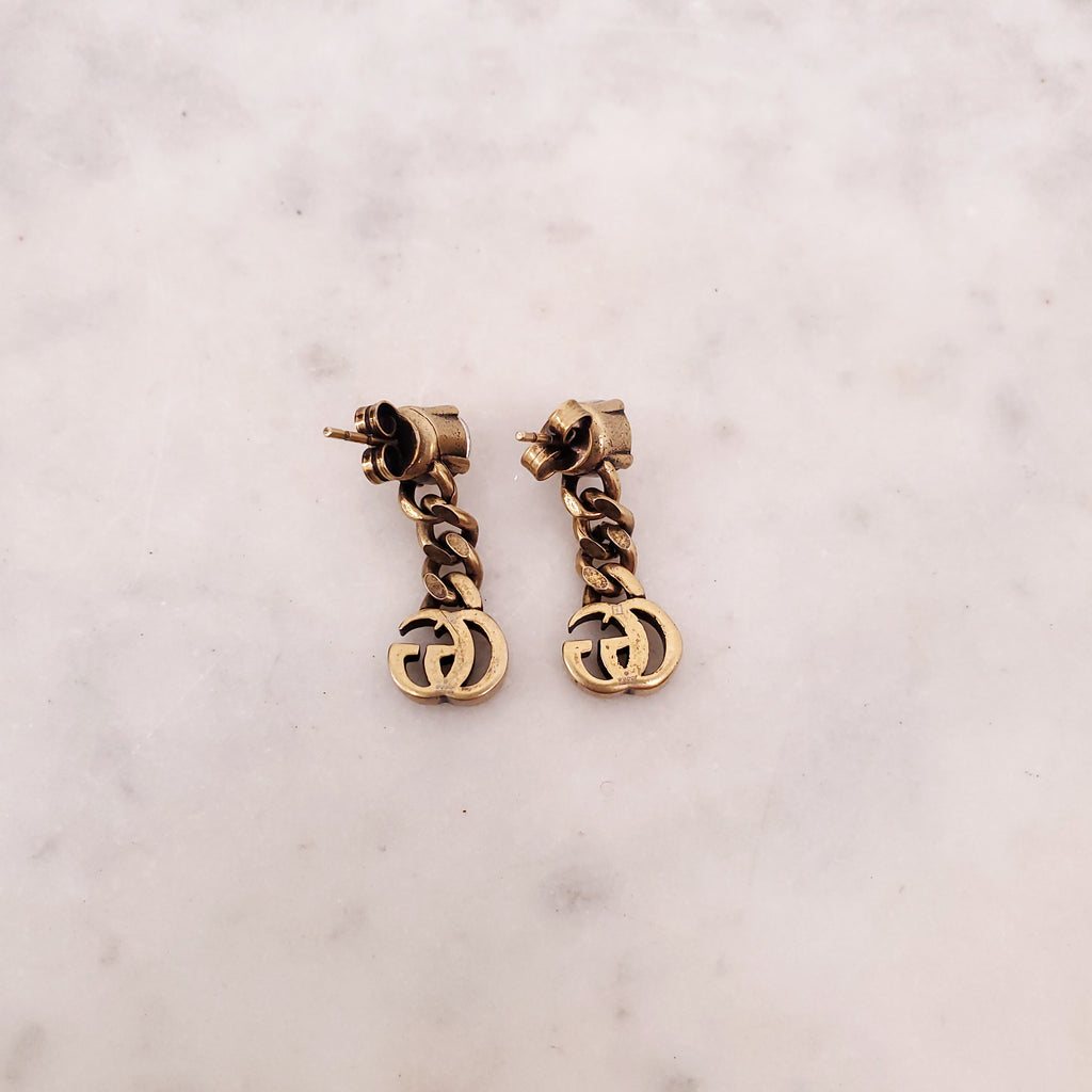 GUCCI GOLD LOGO DROP EARRINGS WITH CRYSTAL