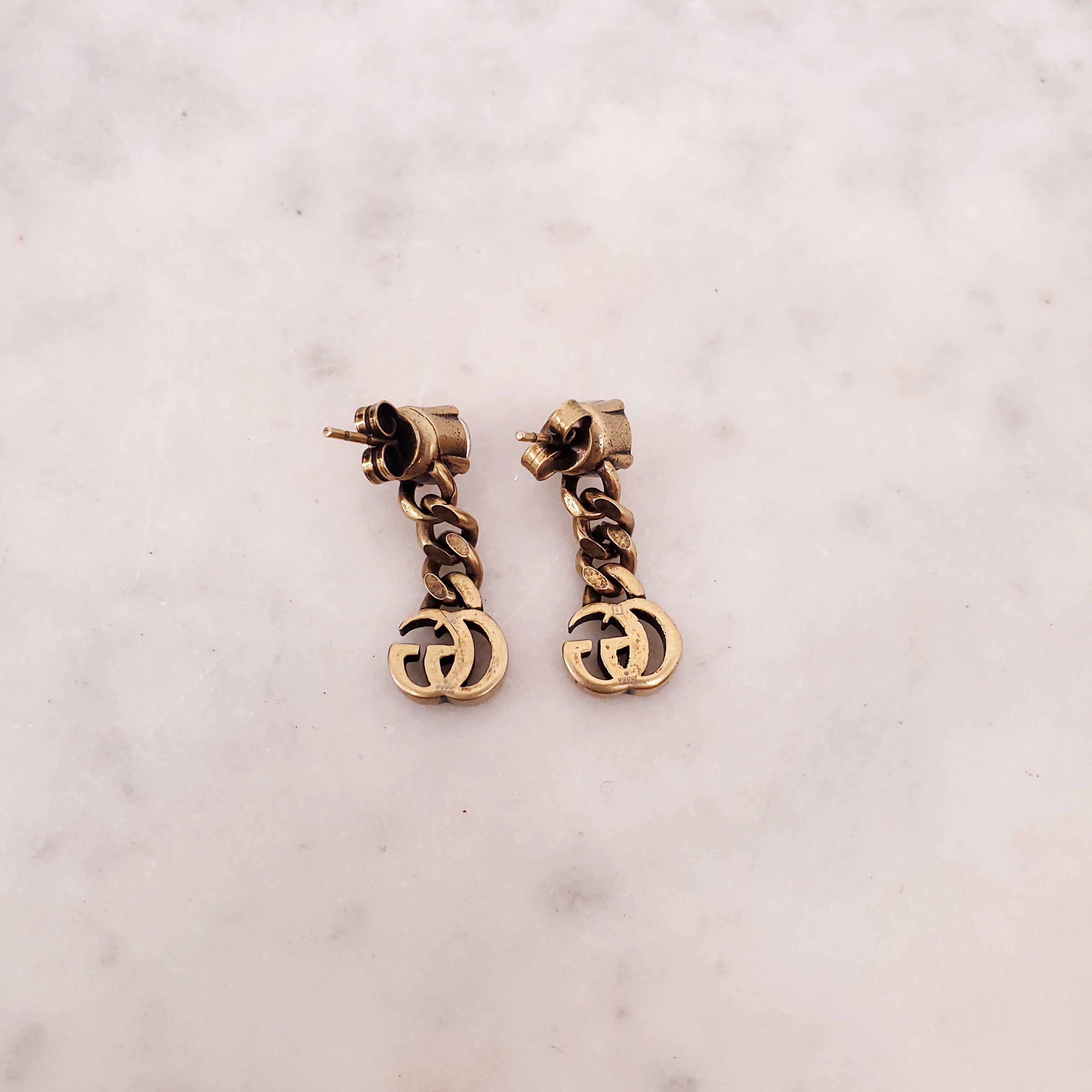 GUCCI GOLD LOGO DROP EARRINGS WITH CRYSTAL