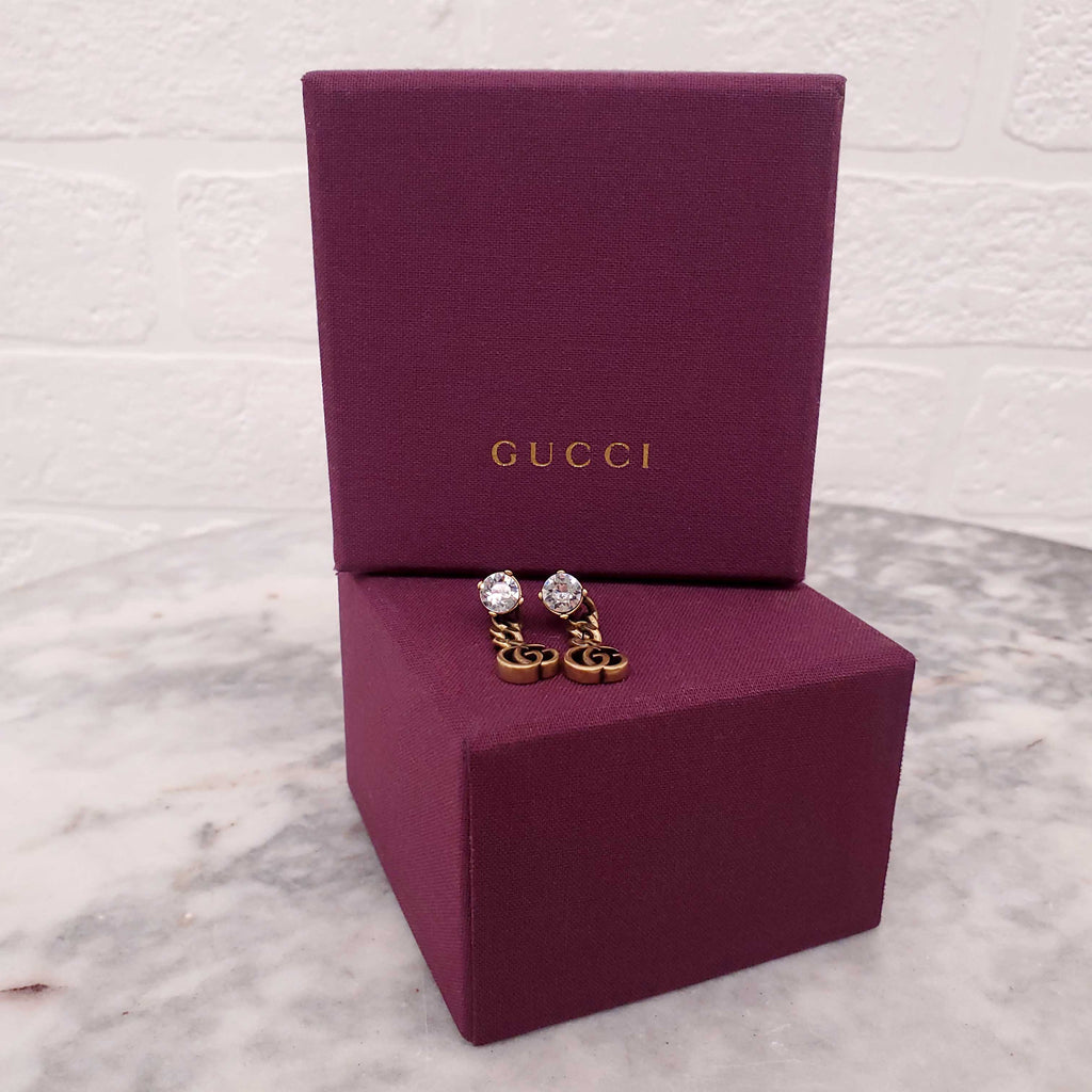 GUCCI GOLD LOGO DROP EARRINGS WITH CRYSTAL