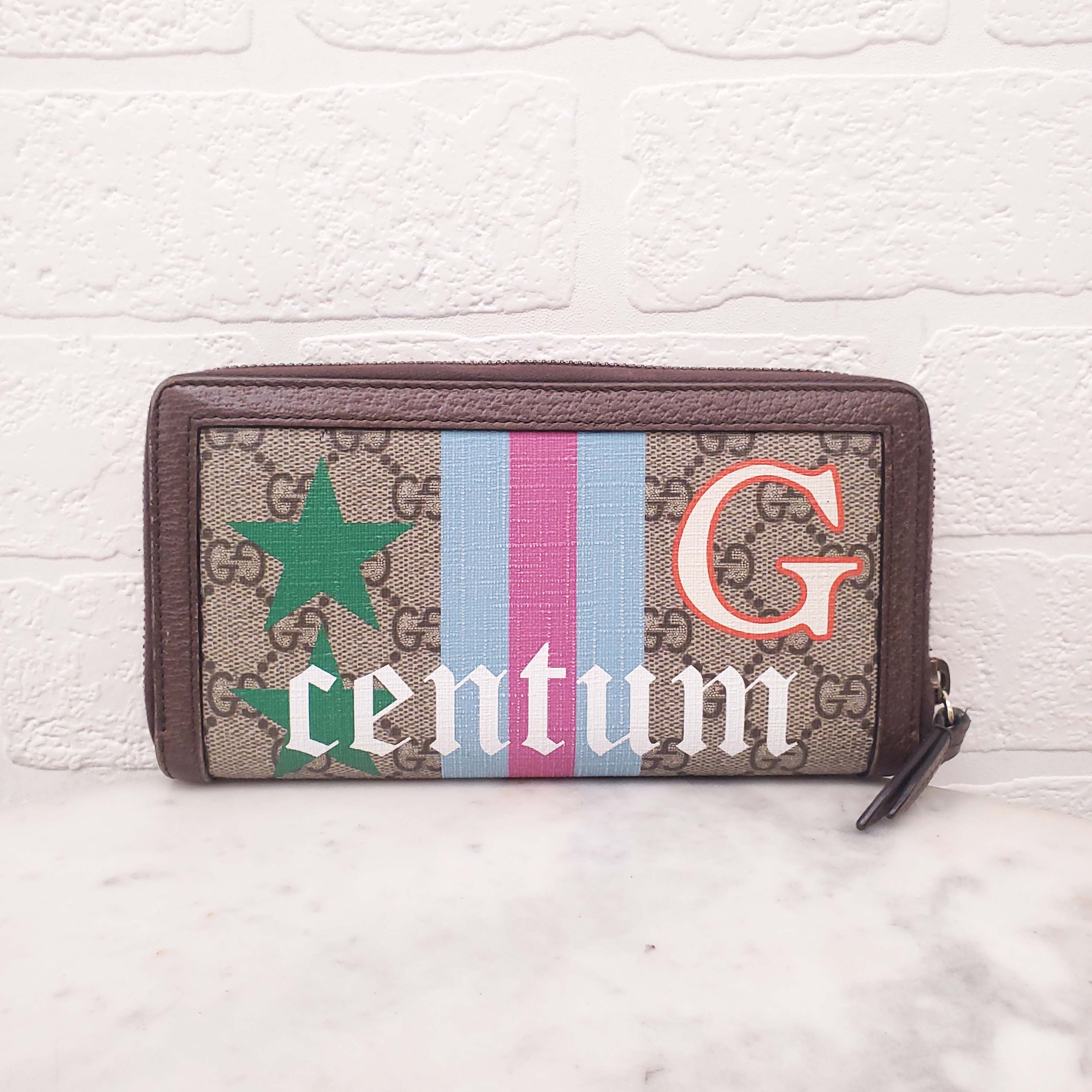 GUCCI MONOGRAM ZIP AROUND WALLET WITH BAMBOO DETAIL