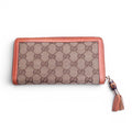GUCCI MONOGRAM ZIP AROUND WALLET WITH BAMBOO TASSEL DETAIL