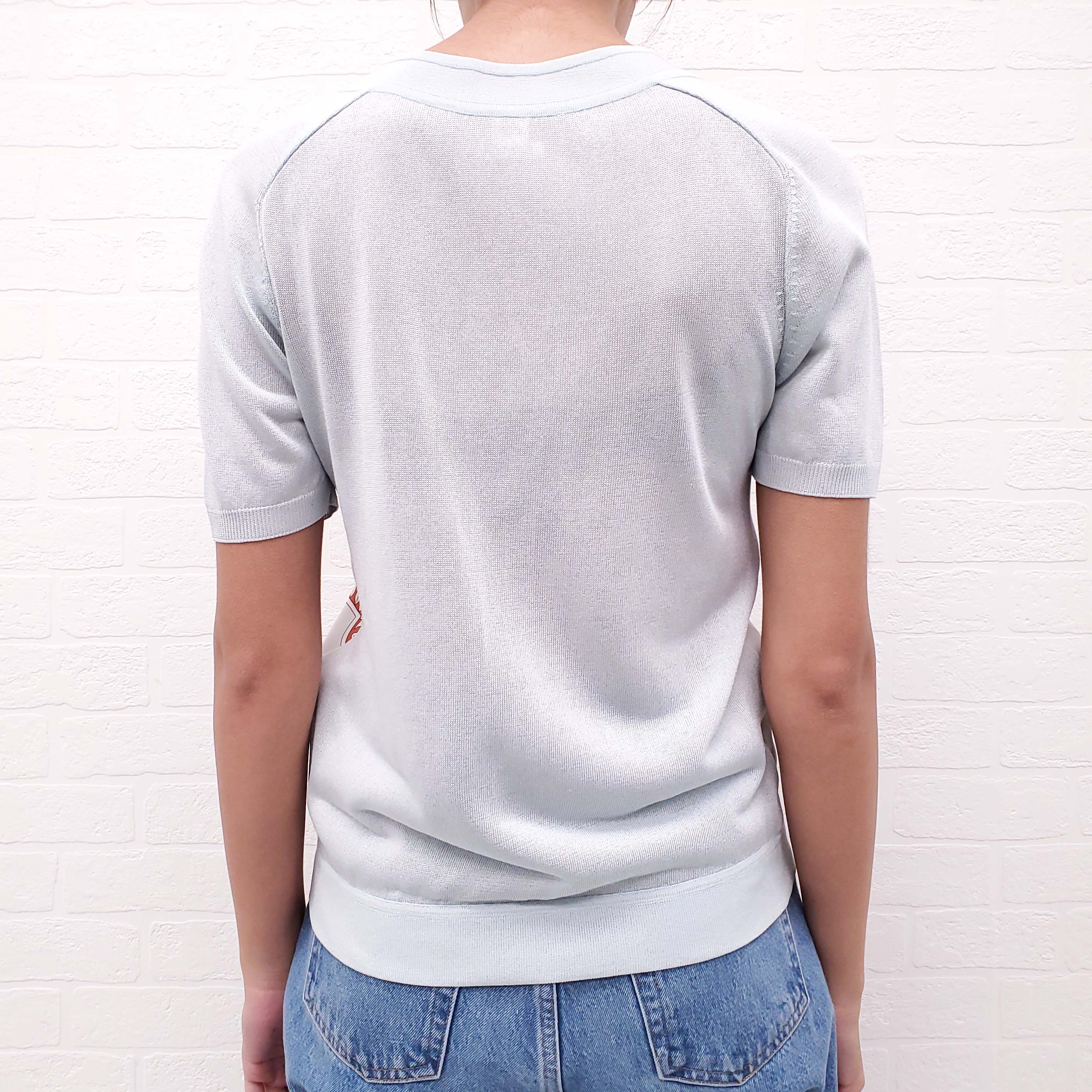 HERMÈS LIGHT BLUE SHORT SLEEVE SILK PATTERNED SWEATER - SIZE 36