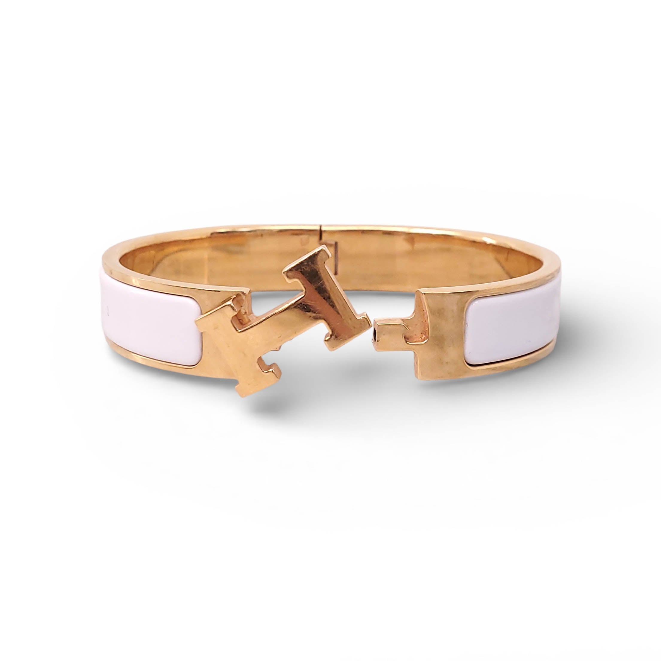 HERMÈS WHITE AND GOLD 'CLIC CLAC' BANGLE