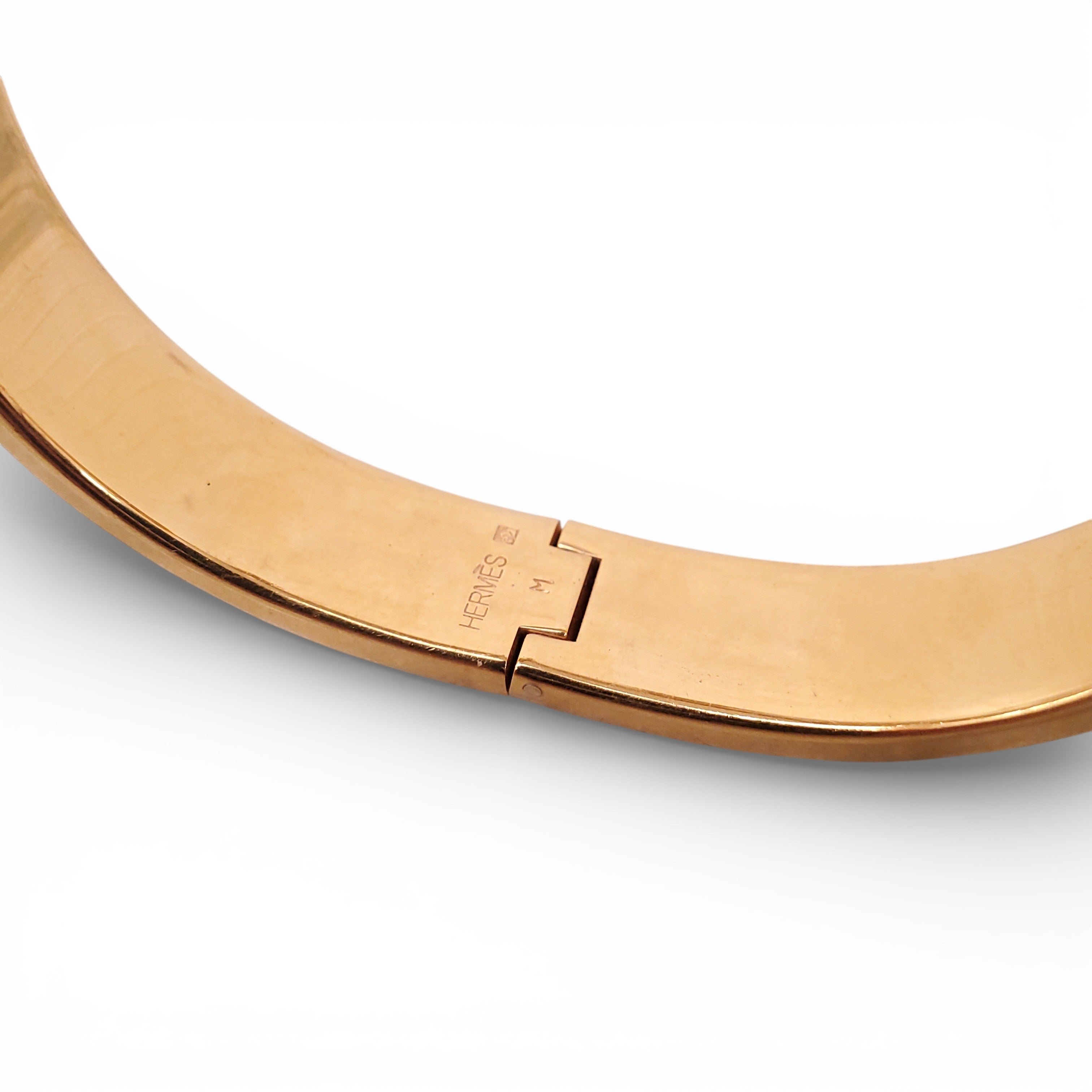 HERMÈS WHITE AND GOLD 'CLIC CLAC' BANGLE