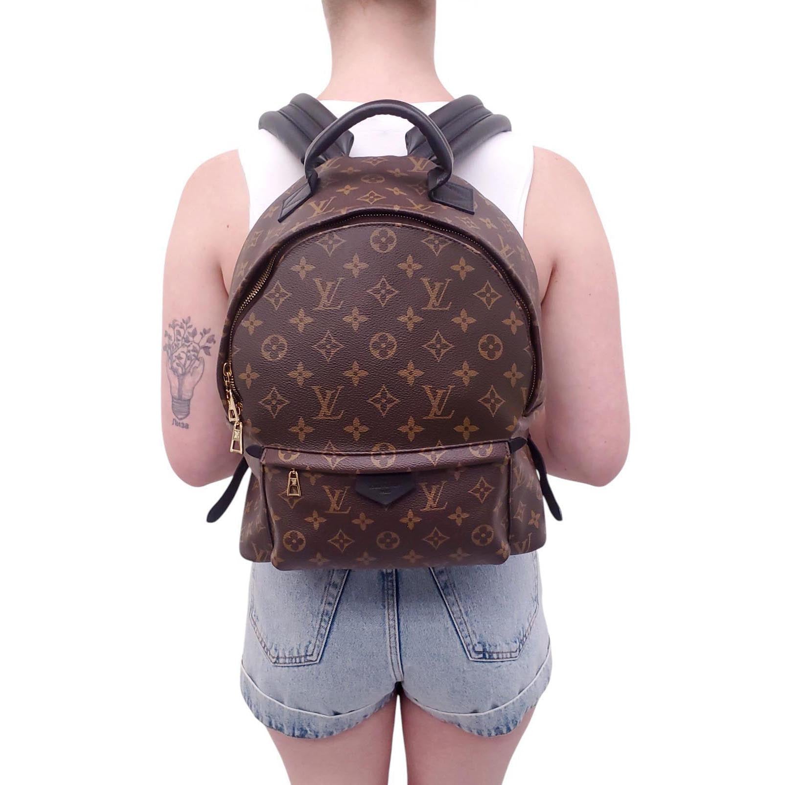 large louis vuitton backpack Discovery PM Monogram Eclipse the practical and stylish montsouris pm backpack by nicolas ghesquire is made from monogram coated canvas Shop Used Louis Vuitton Backpacks
