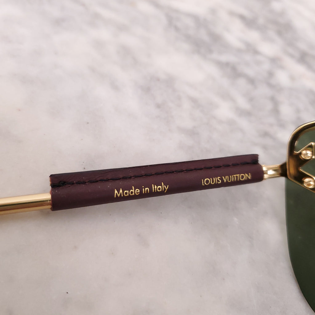 LOUIS VUITTON MASK LOGO SUNGLASSES WITH LEATHER DETAIL