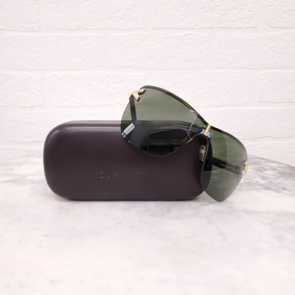 LOUIS VUITTON MASK LOGO SUNGLASSES WITH LEATHER DETAIL