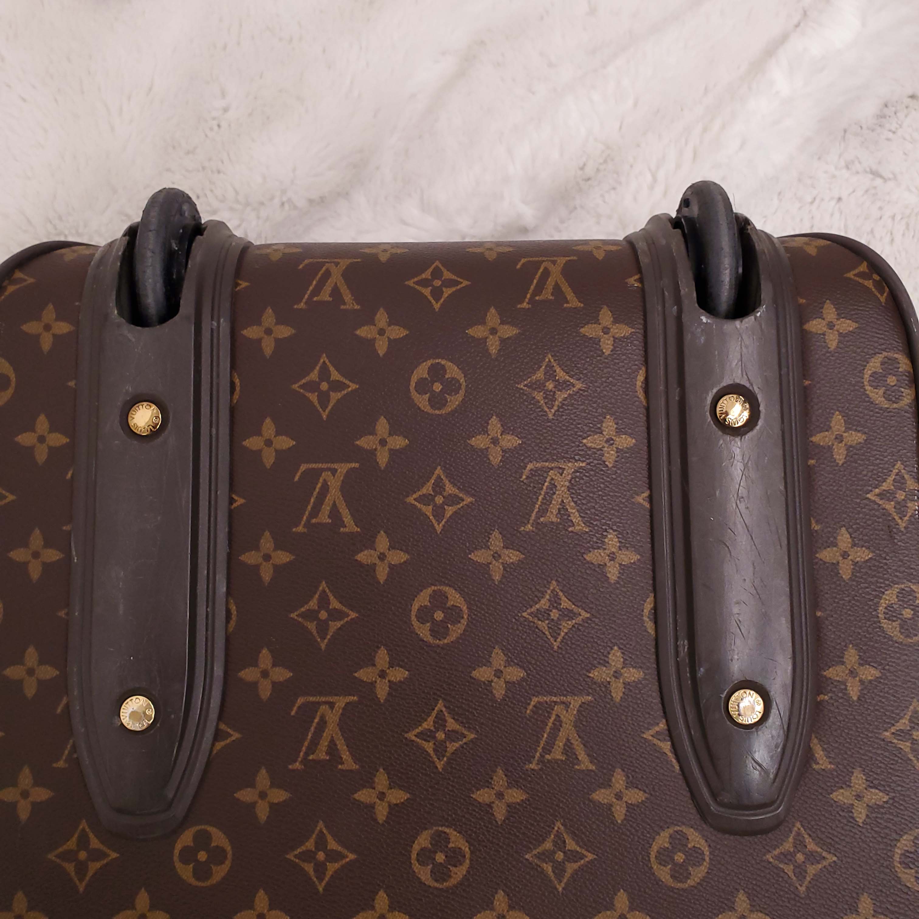 LOUIS VUITTON MONOGRAM ROLLING CARRY ON SUITCASE