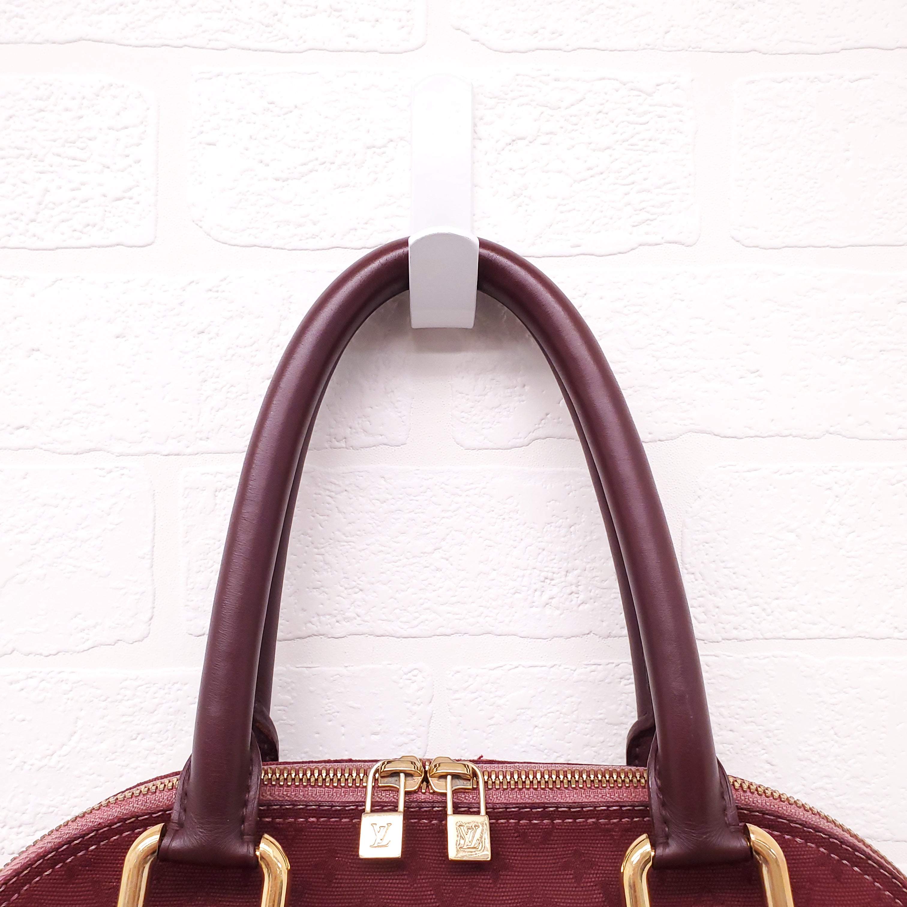 LOUIS VUITTON VINTAGE BURGUNDY MONOGRAM 'ALMA' BAG