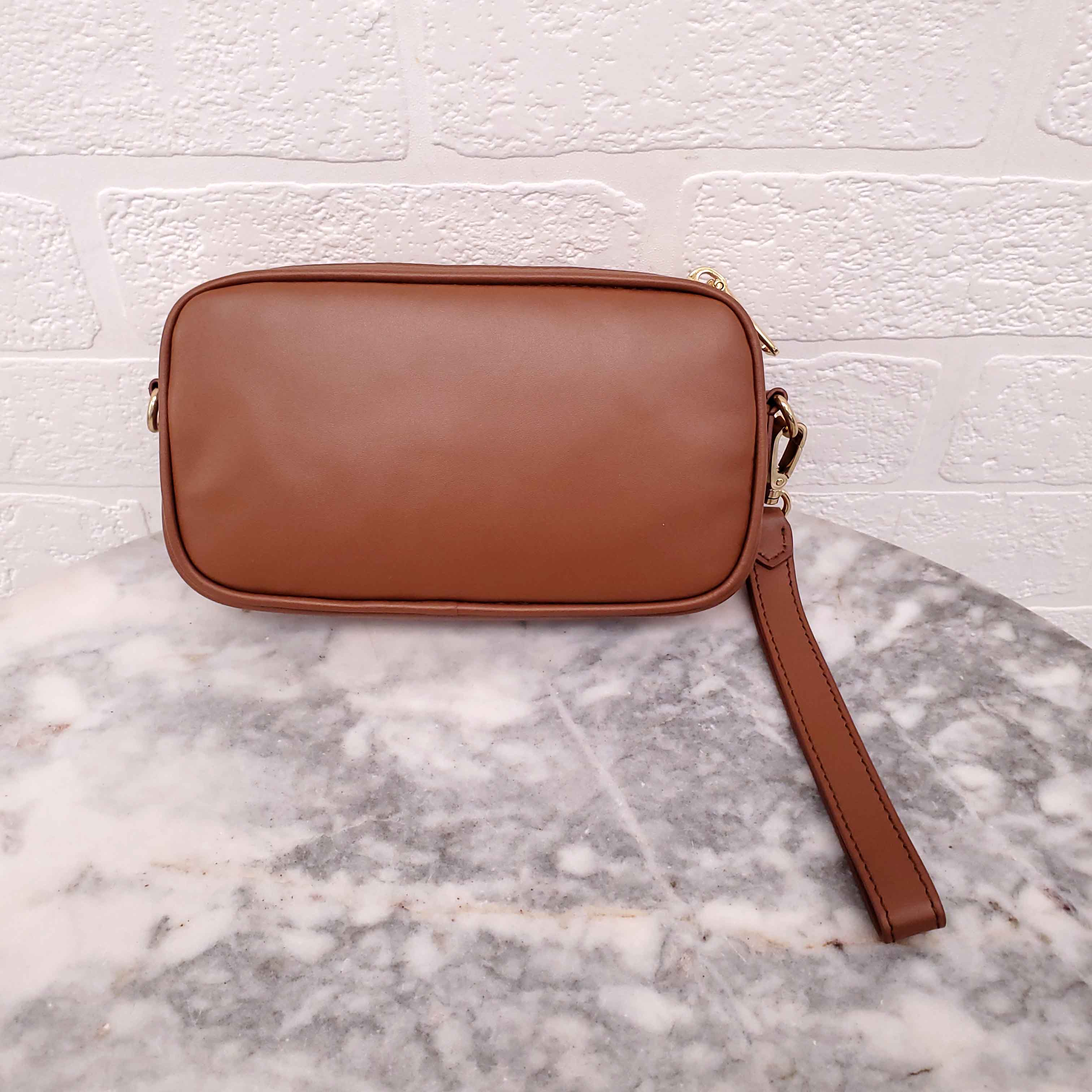 MIU MIU BROWN WRISTLET BAG WITH EMBOSSED LOGO