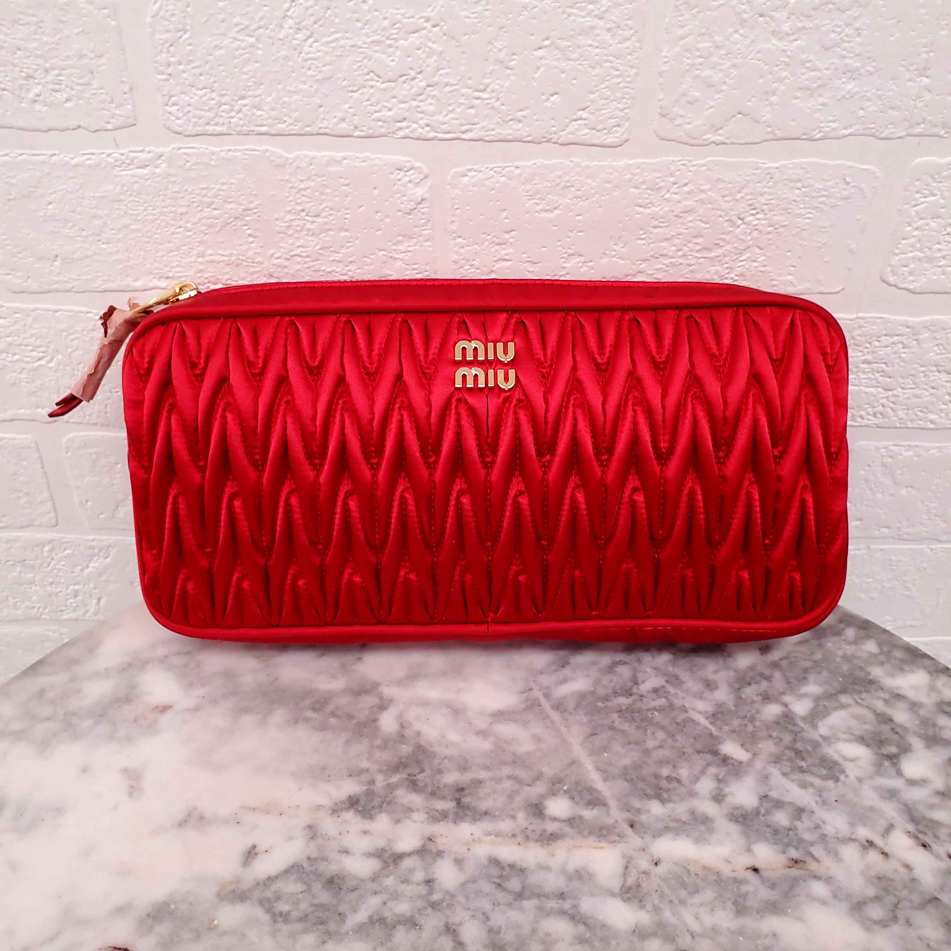 MIU MIU RED WOVEN TRAVEL BAG