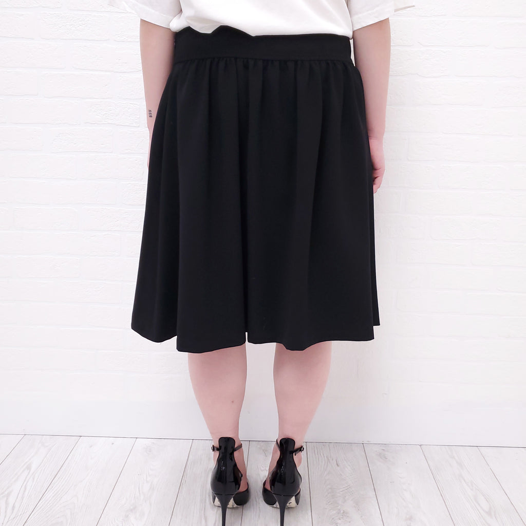 MOSCHINO PLEATED MINI SKIRT - SIZE 10