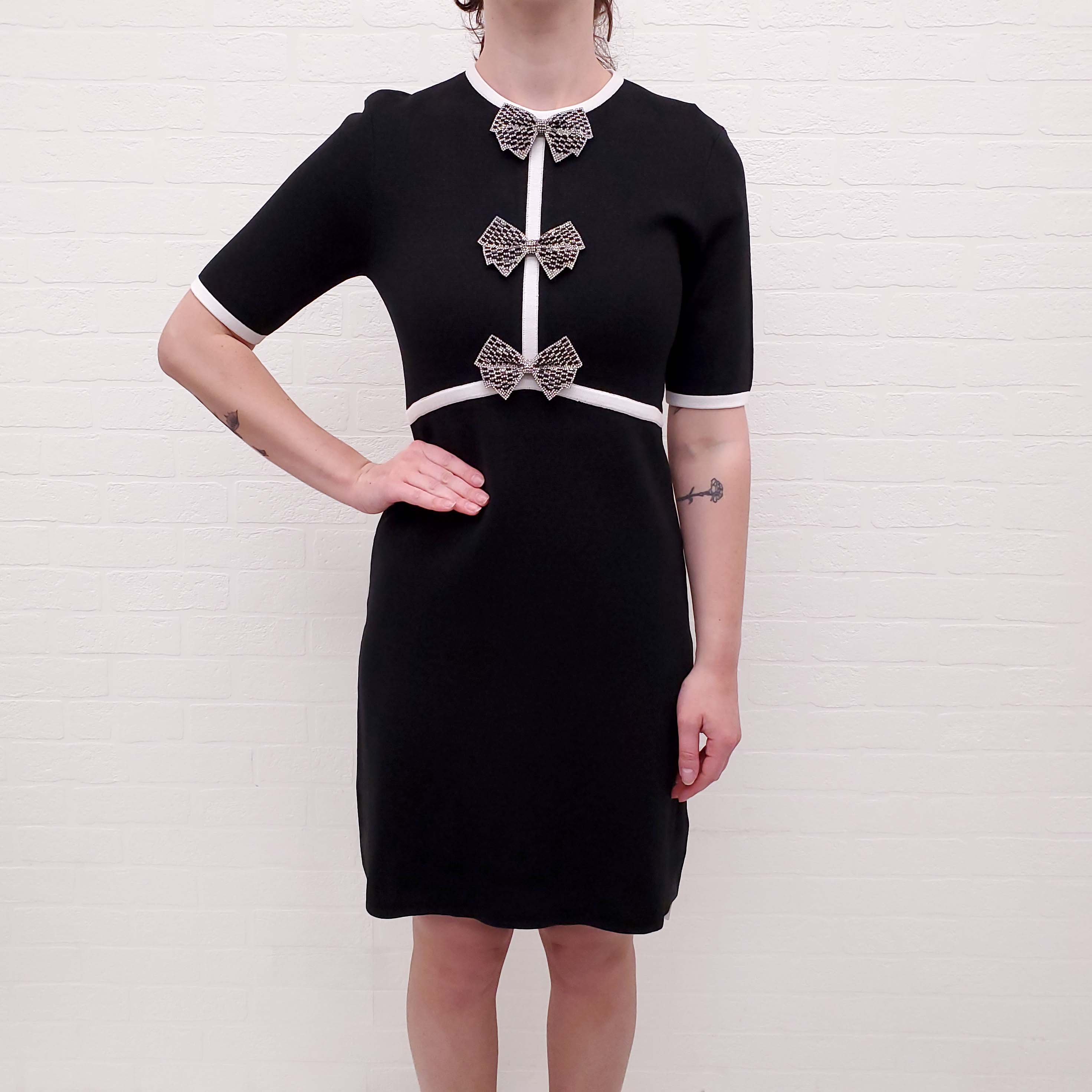 REBECCA VALLANCE BLACK AND WHITE KNIT DRESS WITH CRYSTAL BOWS - SIZE M