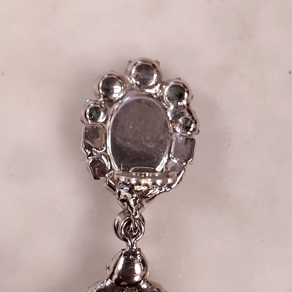 ROBERT SORRELL DIAMOND AND AMETHYST-COLOURED DANGLE RHINESTONE EARRINGS