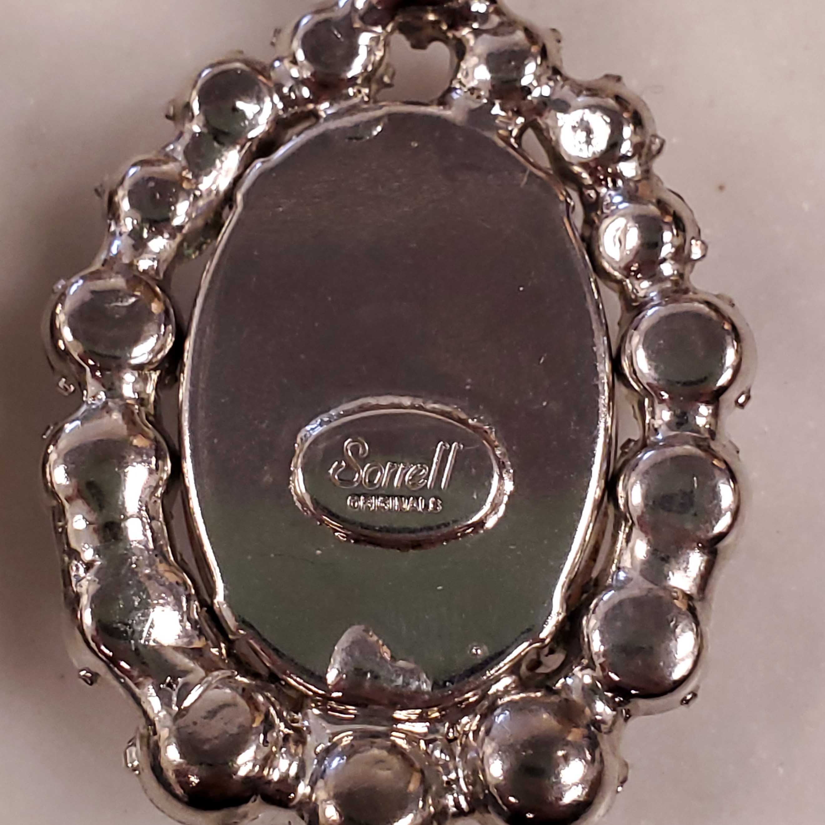 ROBERT SORRELL DIAMOND AND AMETHYST-COLOURED DANGLE RHINESTONE EARRINGS