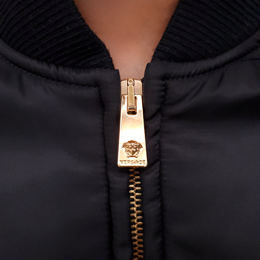 VERSACE BLACK BOMBER JACKET WITH WHITE AND GREY MEDUSA PRINT - SIZE 38