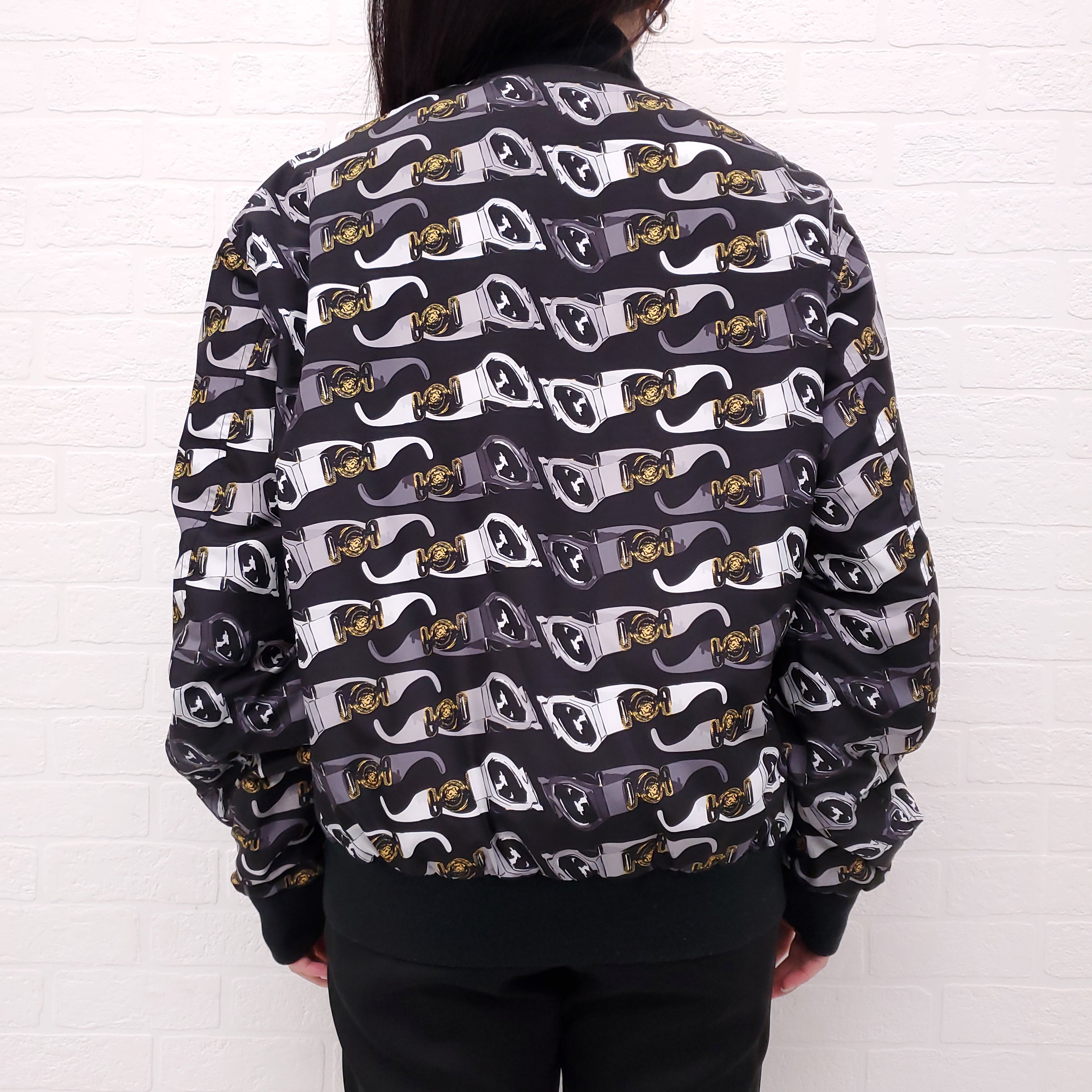 VERSACE BLACK REVERSIBLE BOMBER JACKET WITH SUNGLASSES DETAIL - SIZE 50