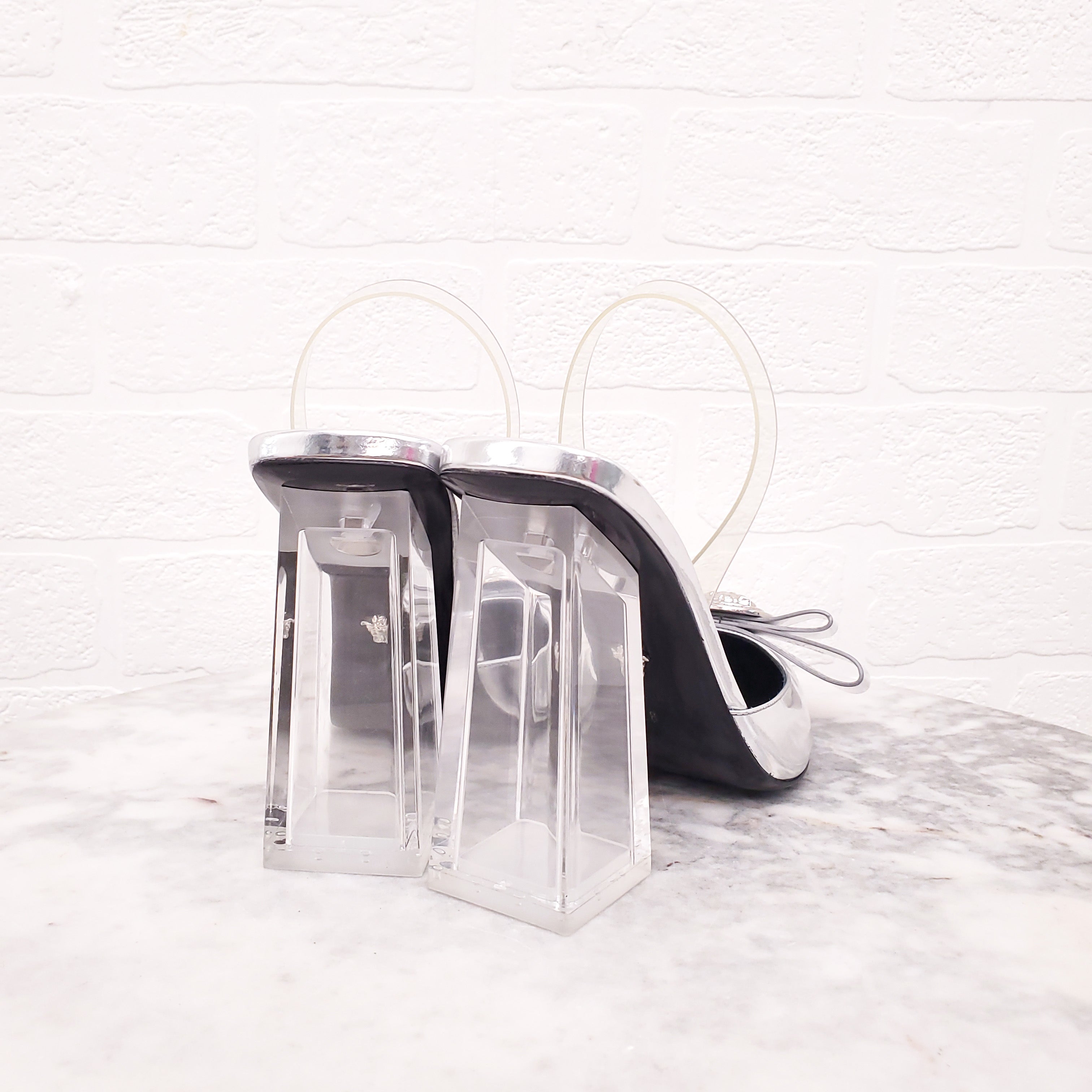 VERSACE SILVER METALLIC BLOCK HEELS WITH TRANSPARENT SLINGBACK STRAP - SIZE 38