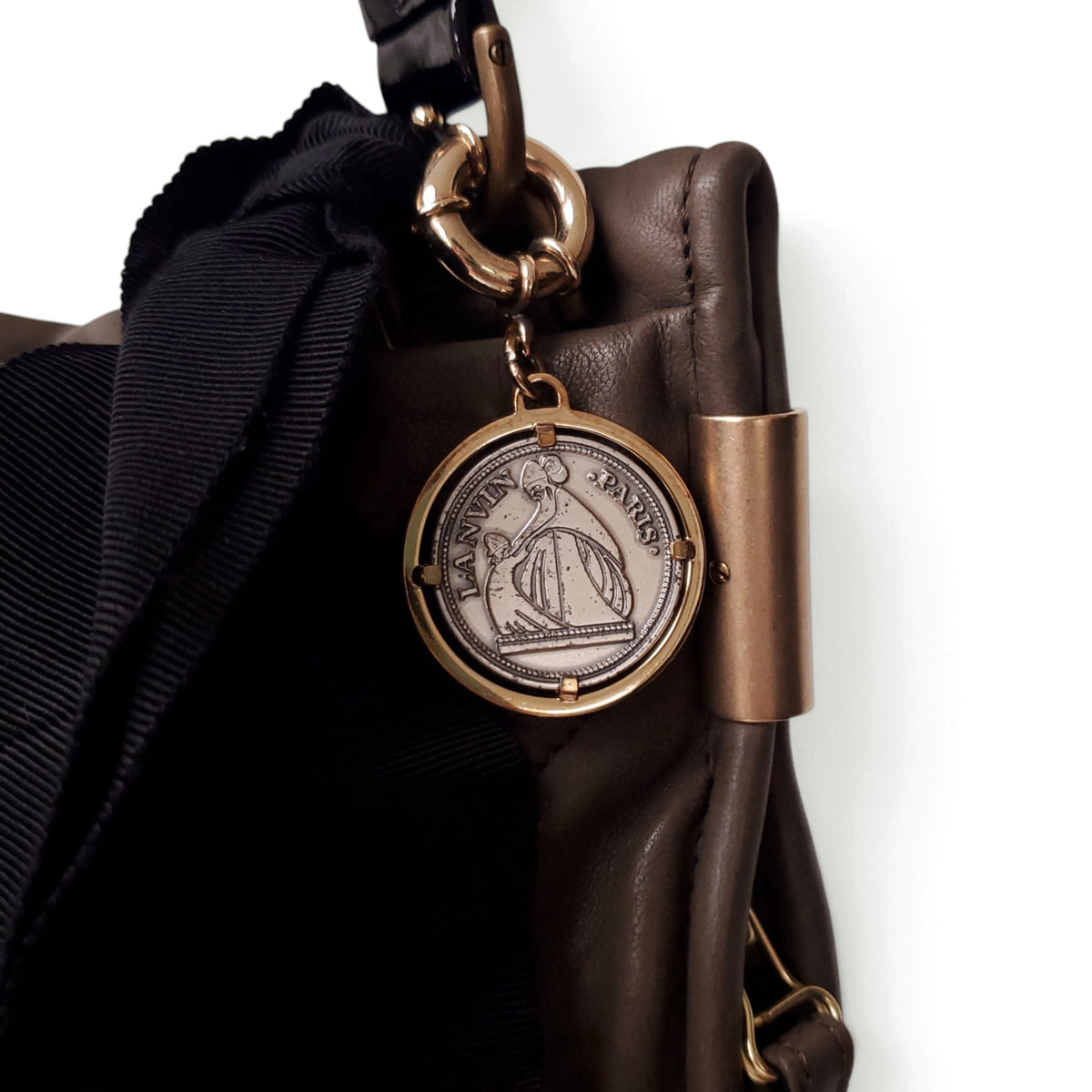 LANVIN TAUPE AND BLACK LEATHER SHOULDER BAG WITH RIBBON AND LOGO COIN