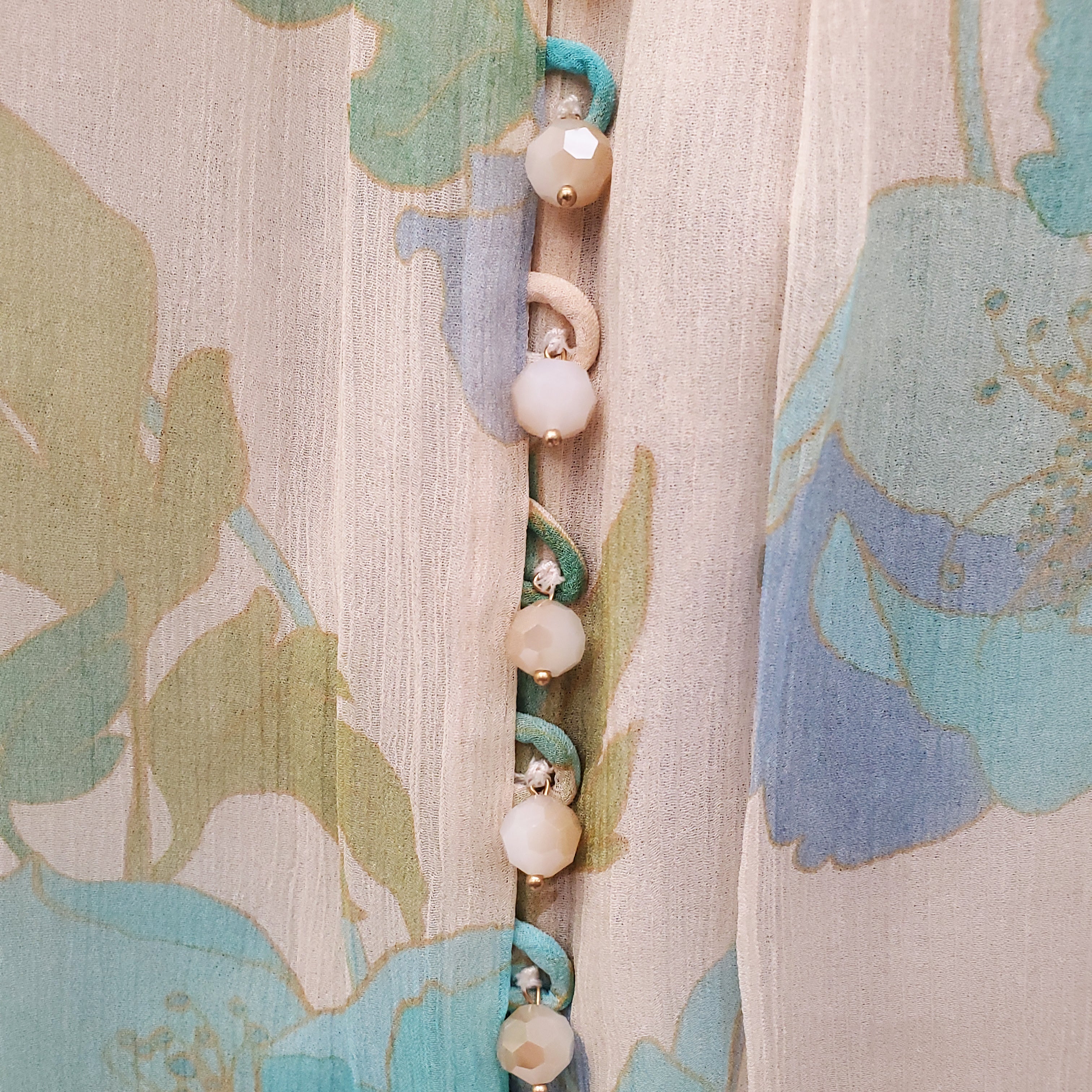 ZIMMERMANN CREAM AND TURQUOISE FLORAL 'RHYTHM PICNIC' BLOUSE - SIZE 3 (US 10)