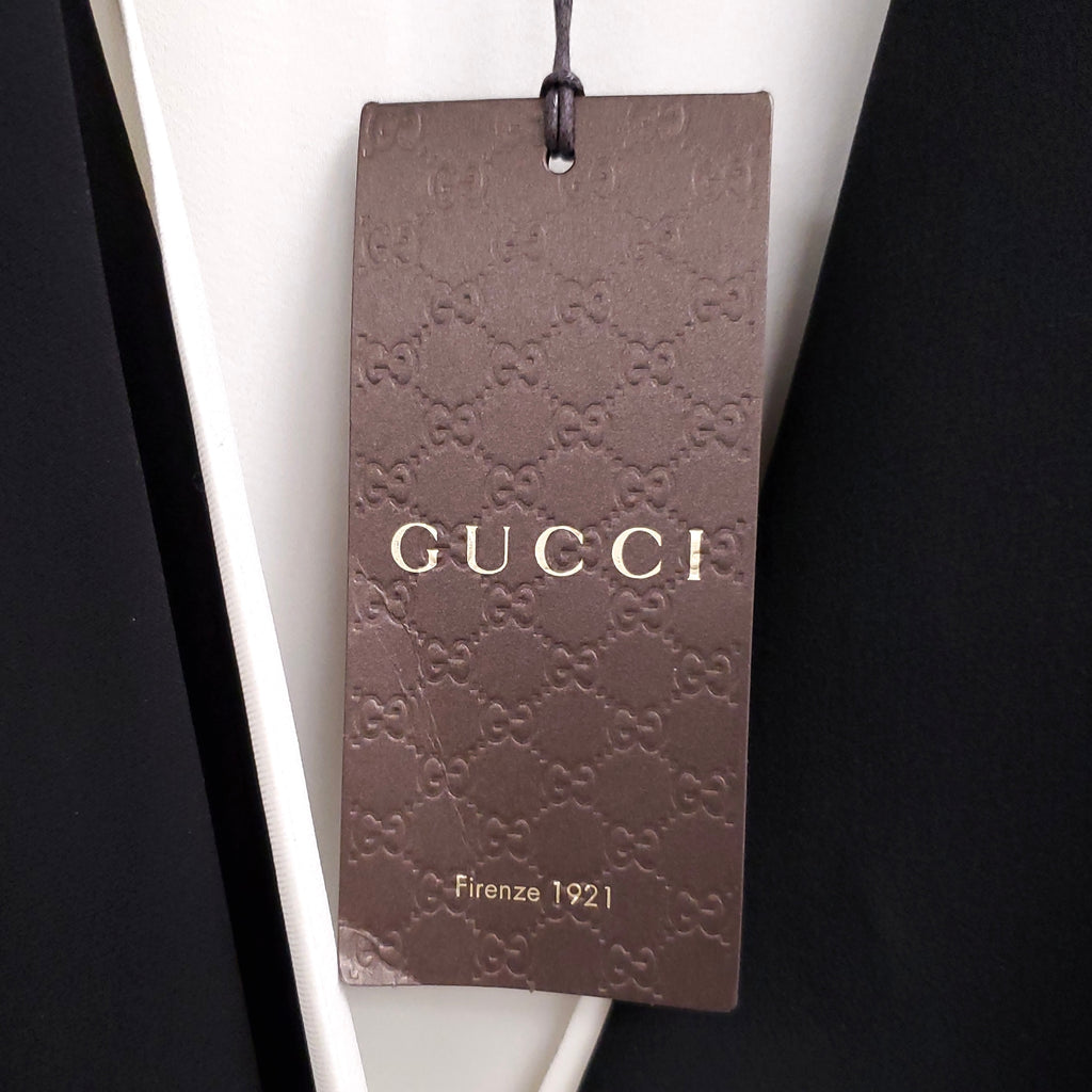 GUCCI BLACK & CREAM PLEATED DRESS WITH GREEN CRYSTAL CLASP ($6900) - SIZE 42